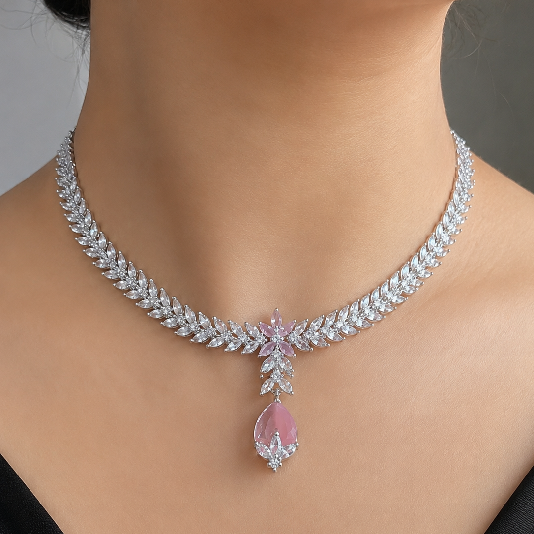 Elegant american diamond necklace with a pink gemstone on a mannequin