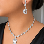 American Diamond necklace and earrings on a model against a neutral background