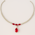 Necklace with red teardrop-shaped gemstones on a light background