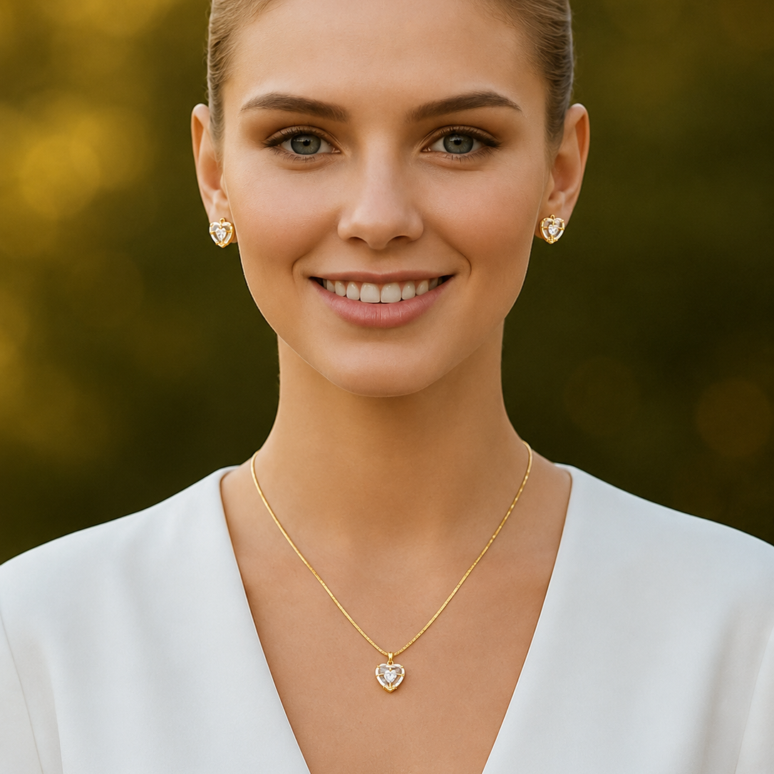 Woman wearing gold tone jewelry with a blurred natural background