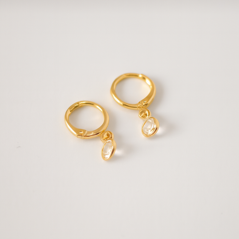 Golden Color Metallic Huggie Hoop Earrings with Oval Crystal Drop
