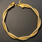 Golden necklace with a dark background