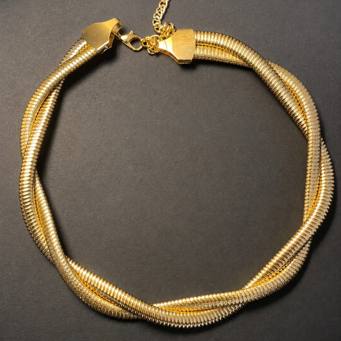 Golden necklace with a dark background