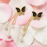 Butterfly hairpins with pearl details on pink and white flower petals