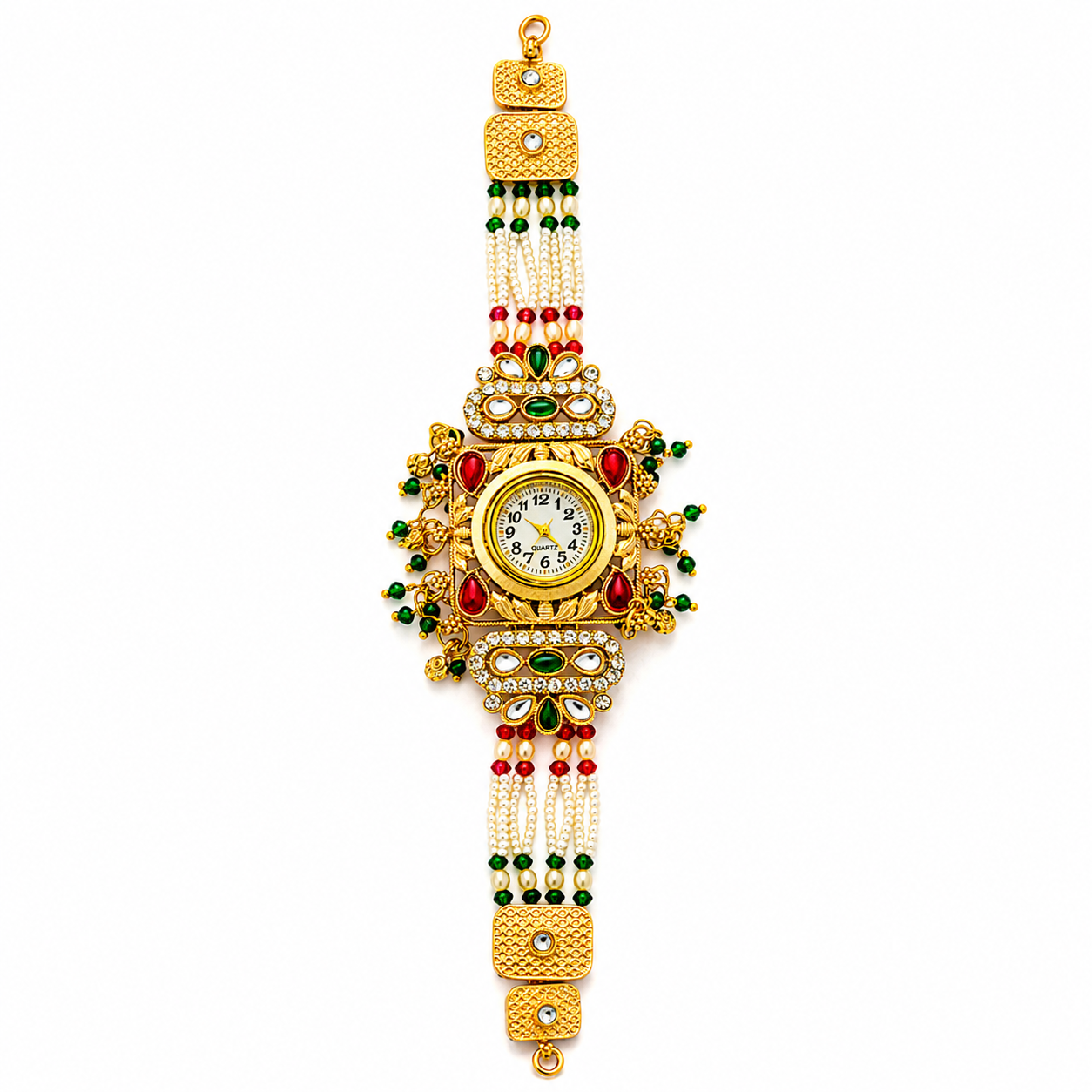 A traditional Indian gold-plated wrist watch (chotki) decorated with red and green stones, white pearl beads, and gold-toned metal links, shown against a plain white background.
